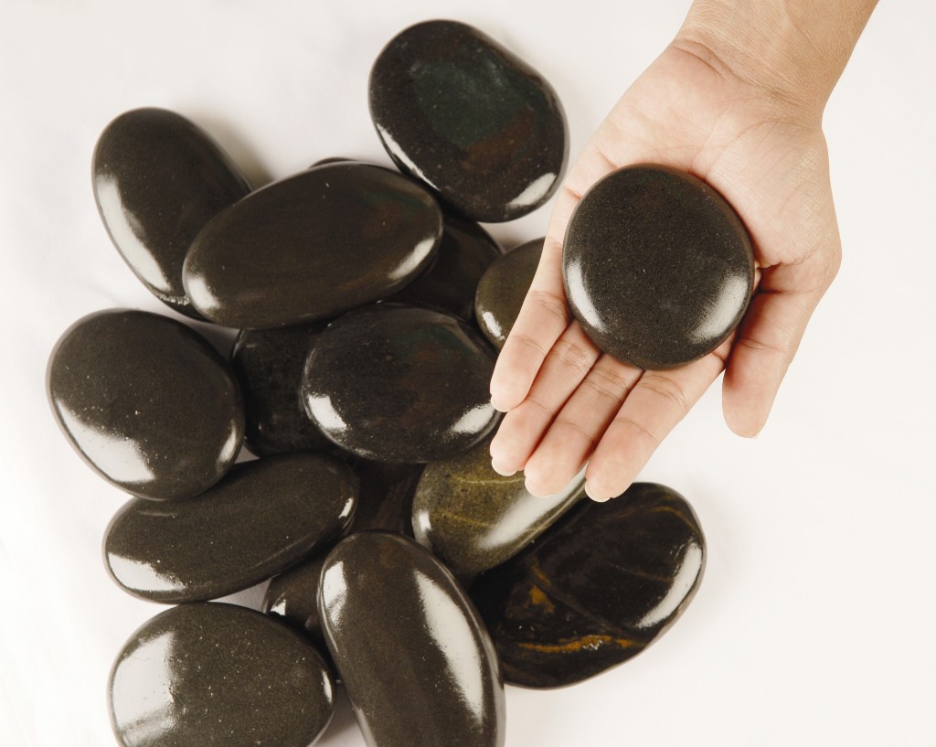 Warm Stones In Winter – Alpine Therapeutic Massage